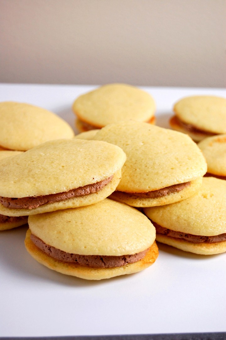 Gluten Free Cake Sandwiches {easy cake batter baked into cookies and sandwiched together with fluffy chocolate buttercream} | emthebaker.com